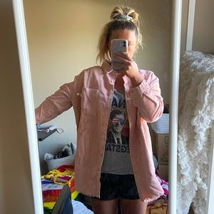 Oversized, light pink jacket.